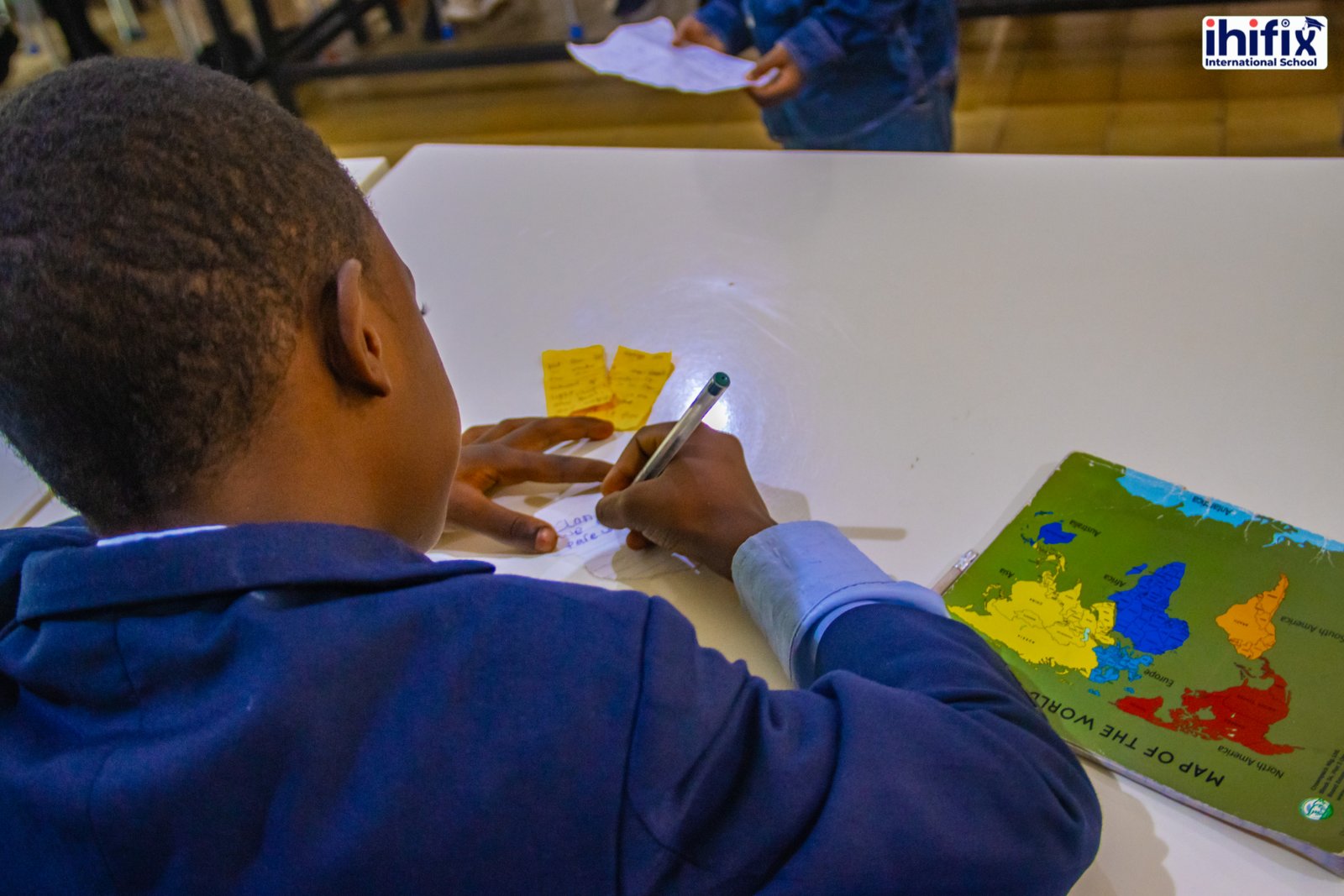 Students working together with a map
